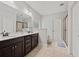 Bathroom with double sink vanity, separate shower, and soaking tub at 2015 Chapel Estates Lane Southeast Ln, Dacula, GA 30019