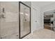 Modern bathroom featuring a tiled shower with glass door at 2015 Chapel Estates Lane Southeast Ln, Dacula, GA 30019