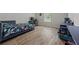 Bedroom showcases a bed, a window, a desk, and a bin of toys at 2015 Chapel Estates Lane Southeast Ln, Dacula, GA 30019