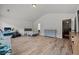 Large bedroom with wood floors, neutral paint and bonus space for an office or play area at 2015 Chapel Estates Lane Southeast Ln, Dacula, GA 30019