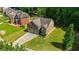 Beautiful two-story home with a well-manicured lawn and a spacious driveway at 2015 Chapel Estates Lane Southeast Ln, Dacula, GA 30019