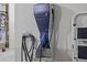 A BMW electric vehicle charging station installed in the garage, promoting sustainable living at 2015 Chapel Estates Lane Southeast Ln, Dacula, GA 30019