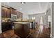 Kitchen featuring stainless appliances, granite counters, and an island at 2015 Chapel Estates Lane Southeast Ln, Dacula, GA 30019
