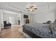 Bright and airy bedroom with ample space, ceiling fan, and natural light at 2015 Chapel Estates Lane Southeast Ln, Dacula, GA 30019