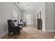 Bright sitting room with hardwood floors and lots of natural light at 2015 Chapel Estates Lane Southeast Ln, Dacula, GA 30019