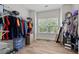 Spacious walk-in closet features ample storage space and natural light at 2015 Chapel Estates Lane Southeast Ln, Dacula, GA 30019