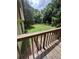 A lush backyard enclosed by a wooden fence, offering privacy and space at 2169 Tiffany Ln, Lithonia, GA 30058