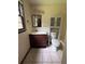 Bathroom with a dark vanity, white toilet and tiled flooring at 2169 Tiffany Ln, Lithonia, GA 30058