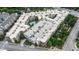 Aerial view of complex featuring a swimming pool, landscaped courtyards, and ample parking at 390 17Th Nw St # 4031, Atlanta, GA 30363
