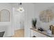 Bright entryway with modern decor, tiled floor, and white walls creates an inviting welcome at 390 17Th Nw St # 4031, Atlanta, GA 30363