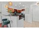 Kitchen view with stainless steel appliances, stone backsplash, and breakfast bar at 390 17Th Nw St # 4031, Atlanta, GA 30363