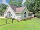 Large fenced backyard with plenty of green grass, ideal for outdoor enjoyment at 401 Crosshaven Way, Mcdonough, GA 30253