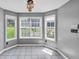Breakfast nook with multiple windows providing lots of natural light and views of the property at 401 Crosshaven Way, Mcdonough, GA 30253