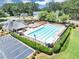Overhead view features a large community pool with ample seating, enhancing the outdoor living experience at 401 Crosshaven Way, Mcdonough, GA 30253