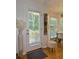 Door leading to the outside with wooden deck is visible through the glass at 507 Legacy Park Ln, Powder Springs, GA 30127