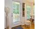 Eat-in kitchen area features a door to deck, bay windows, and views of the backyard at 507 Legacy Park Ln, Powder Springs, GA 30127