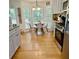 Bright kitchen boasts stainless appliances, granite counters, and an eat-in breakfast area at 507 Legacy Park Ln, Powder Springs, GA 30127