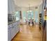 Kitchen features granite countertops, stainless appliances, and breakfast nook at 507 Legacy Park Ln, Powder Springs, GA 30127