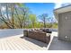 Relax on the rooftop deck with comfortable seating, offering a serene escape with cityscape glimpses at 1231 Barnes Nw St, Atlanta, GA 30318