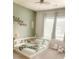 Brightly decorated room with custom bookshelves, decor and neutral carpet at 126 Jacobs Ln, Loganville, GA 30052