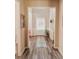 Inviting entryway with wood-look flooring, and a view of the front door at 126 Jacobs Ln, Loganville, GA 30052