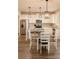 Well-lit kitchen featuring white cabinets, stainless steel appliances, and eat in breakfast nook at 126 Jacobs Ln, Loganville, GA 30052