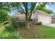 View of a home's exterior, featuring a garage and a fenced-in yard at 615 Brookwater Dr, Stockbridge, GA 30281