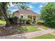 Charming single-story home with landscaped front yard and inviting entrance at 615 Brookwater Dr, Stockbridge, GA 30281