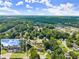 Captivating aerial view with home highlighted amid a lush, green landscape at 625 Hickory Nobb, Sugar Hill, GA 30518