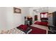 Comfortable bedroom with area rug and view to another bedroom at 625 Hickory Nobb, Sugar Hill, GA 30518
