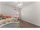 Bedroom with a bed, bright window with curtains, and neutral-toned carpet, providing a clean and peaceful space at 625 Hickory Nobb, Sugar Hill, GA 30518