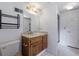 Full bathroom featuring a shower, decorative lighting, and marble countertop vanity at 5826 Andover Way, Tucker, GA 30084