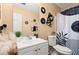 Charming bathroom with a sleek vanity, toilet and contemporary decor for a stylish space at 7030 Kingston Ln, Mcdonough, GA 30253