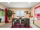 Cozy dining area with sliding glass doors and a view to the outdoor scenery at 7030 Kingston Ln, Mcdonough, GA 30253