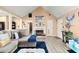 Open living room features fireplace, gray couch, and lots of space at 7030 Kingston Ln, Mcdonough, GA 30253