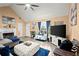 Inviting living room with fireplace, sleek furniture, and lots of natural light at 7030 Kingston Ln, Mcdonough, GA 30253