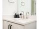Clean bathroom featuring a quartz countertop, modern fixtures, and decorative accessories at 1762 Beckham Ne Pl, Atlanta, GA 30324
