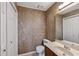 Bathroom with neutral walls, sink, and toilet at 1926 Cheatham Woods Sw Dr, Marietta, GA 30008