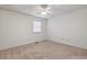 Bedroom with neutral walls and carpet at 1926 Cheatham Woods Sw Dr, Marietta, GA 30008