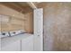 Laundry room with washer and dryer at 1926 Cheatham Woods Sw Dr, Marietta, GA 30008