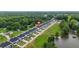 Townhomes along a beautiful lake with lush greenery, showcasing the community's natural surroundings at 2326 Britt St, Grayson, GA 30017