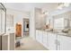 Bathroom featuring double sinks, granite counters, and neutral tones at 2326 Britt St, Grayson, GA 30017