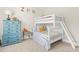 Charming bedroom featuring a white bunk bed, blue dresser, and playful decor for a cozy ' space at 2326 Britt St, Grayson, GA 30017