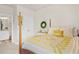 Comfortable bedroom with four-poster bed and ensuite bathroom, offering a private and relaxing space at 2326 Britt St, Grayson, GA 30017