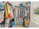 Walk-in closet with rods and shelves for storing clothes and accessories at 2326 Britt St, Grayson, GA 30017