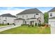 Attractive home showcases mature landscaping and an attached garage enhancing its curb appeal at 2326 Britt St, Grayson, GA 30017