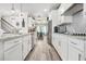 Bright kitchen featuring granite countertops, stainless appliances, and a view to the dining room at 2326 Britt St, Grayson, GA 30017