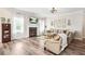 Inviting living room with a fireplace, comfortable seating, and ample natural light at 2326 Britt St, Grayson, GA 30017