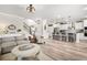 Open-concept living space with a living room and a kitchen with a center island at 2326 Britt St, Grayson, GA 30017