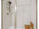 Enclosed tile shower with adjustable shower head and built-in seat at 2326 Britt St, Grayson, GA 30017
